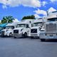 Trucks in Status Transportation Lot