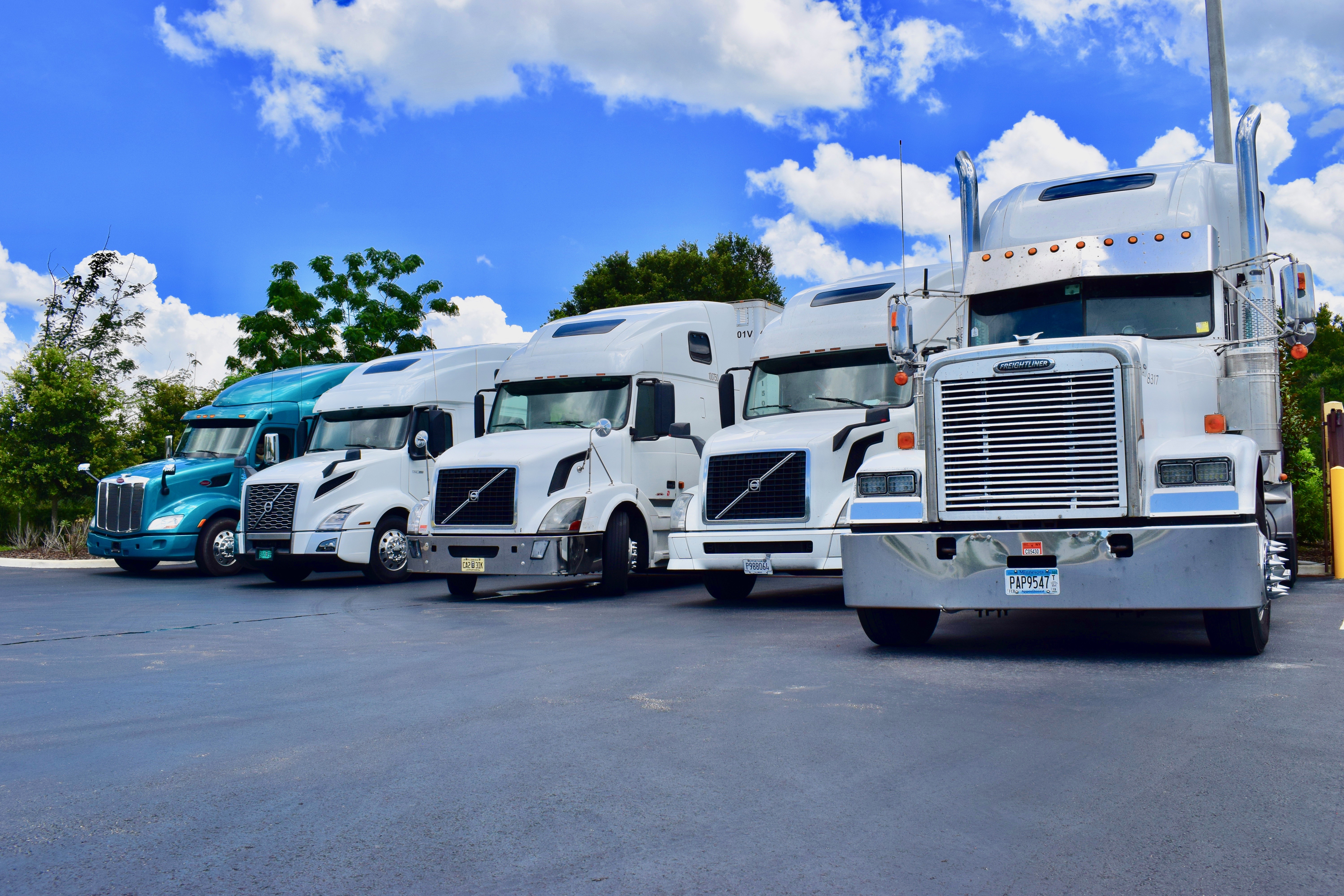 Trucks in Status Transportation Lot